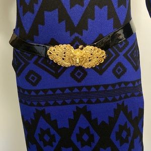 Authentic Versace Belt.   Tip Of Lion a little blemished.  32 Inches long.